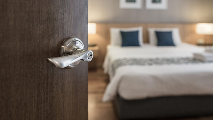 HotelRoomCondominiumOrApartmentDoorwayWithOpenDoor