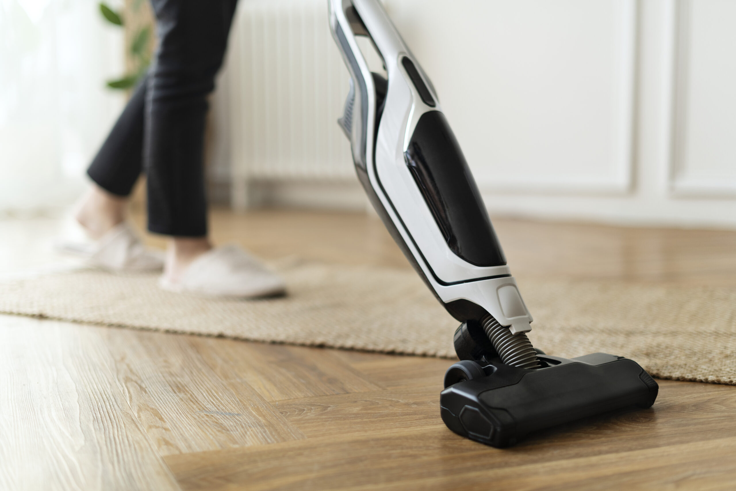 housewife-vacuuming-parquet-floor.jpg