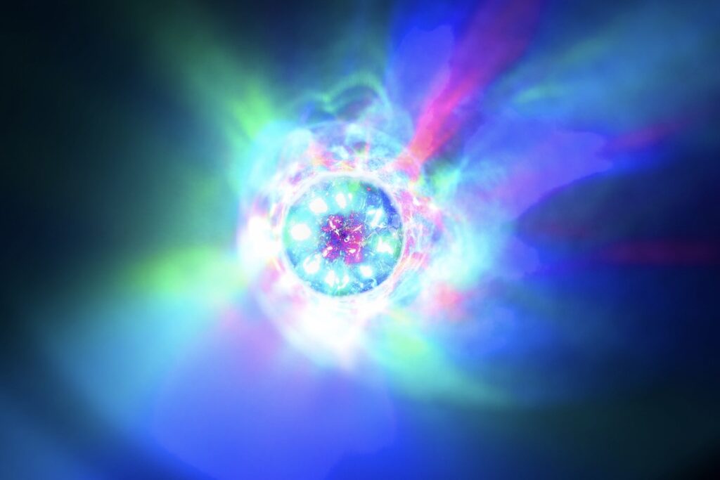 Абстрактный фон с разноцветной сферой посередине
