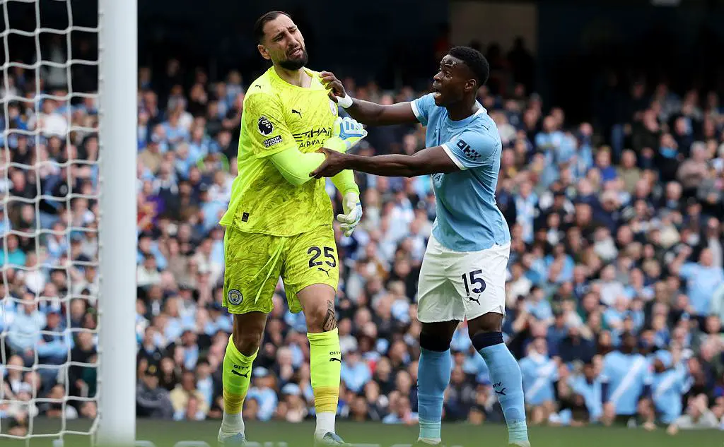 Джанлуиджи Доннарумма (слева) (Michael Regan / Getty Images)