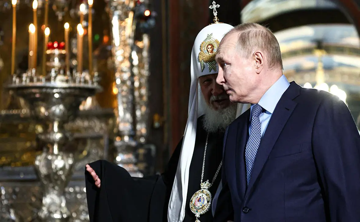 Патриарх Кирилл и Владимир Путин (Михаил Терещенко / ТАСС)