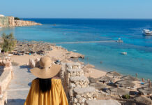 АТОР утверждает, что туризм в Stella Di Mare Beach Hotel & Spa безопасен HappyAfricanAmericanWomanInYellowDressAndSunHat