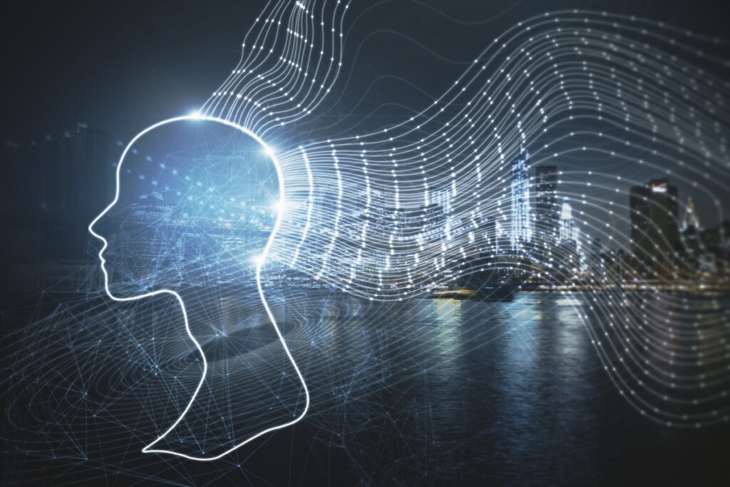 Креативный цифровой контур головы на размытом фоне ночного города
