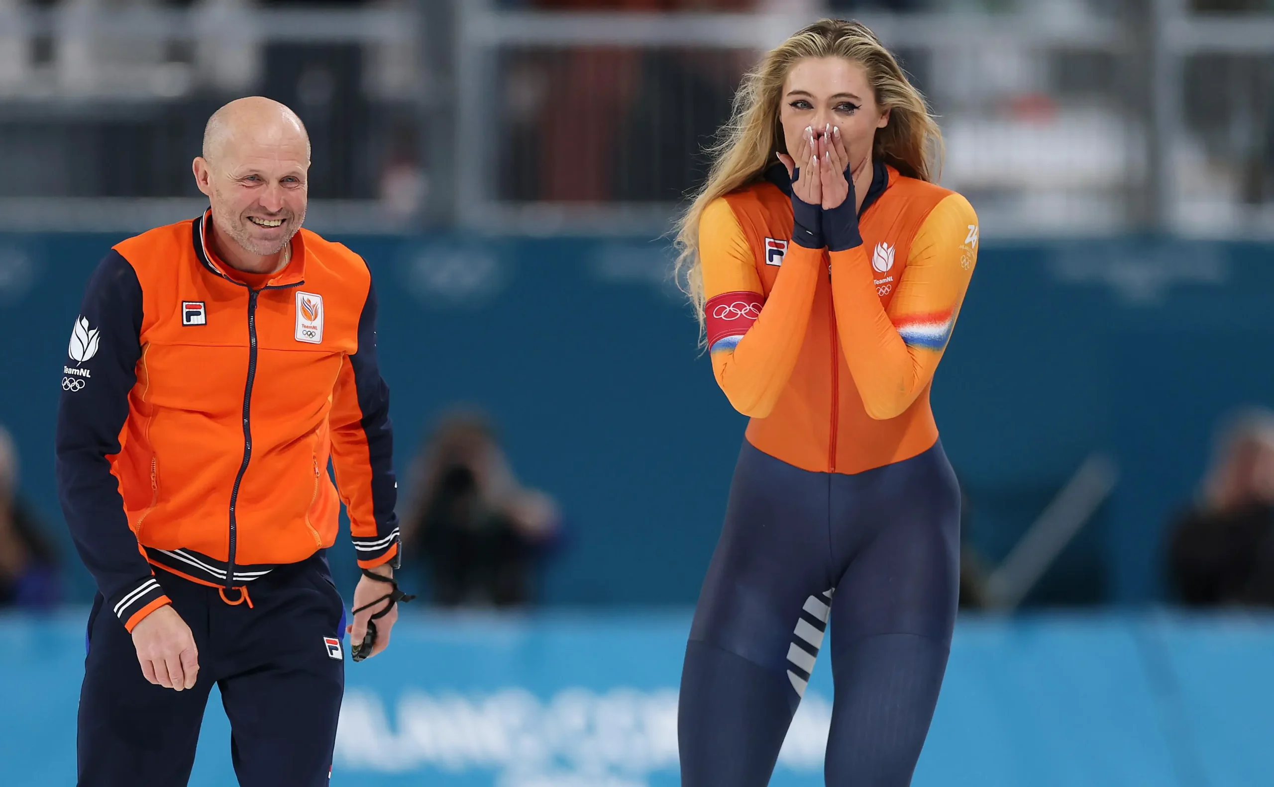 Тренер Константин Полтавец и чемпионка Олимпиады-2026 в конькобежном спорте Ютта Лердам  (Dean Mouhtaropoulos / Getty Images)
