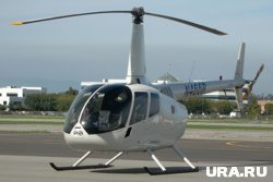 Вертолет Robinson.Stock