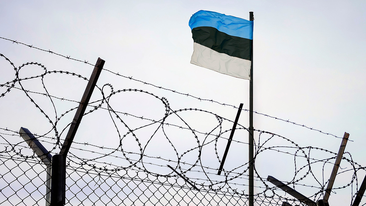 Concept,Of,Estonia,Closed,Borders,With,Flag,And,Wire,Fence.