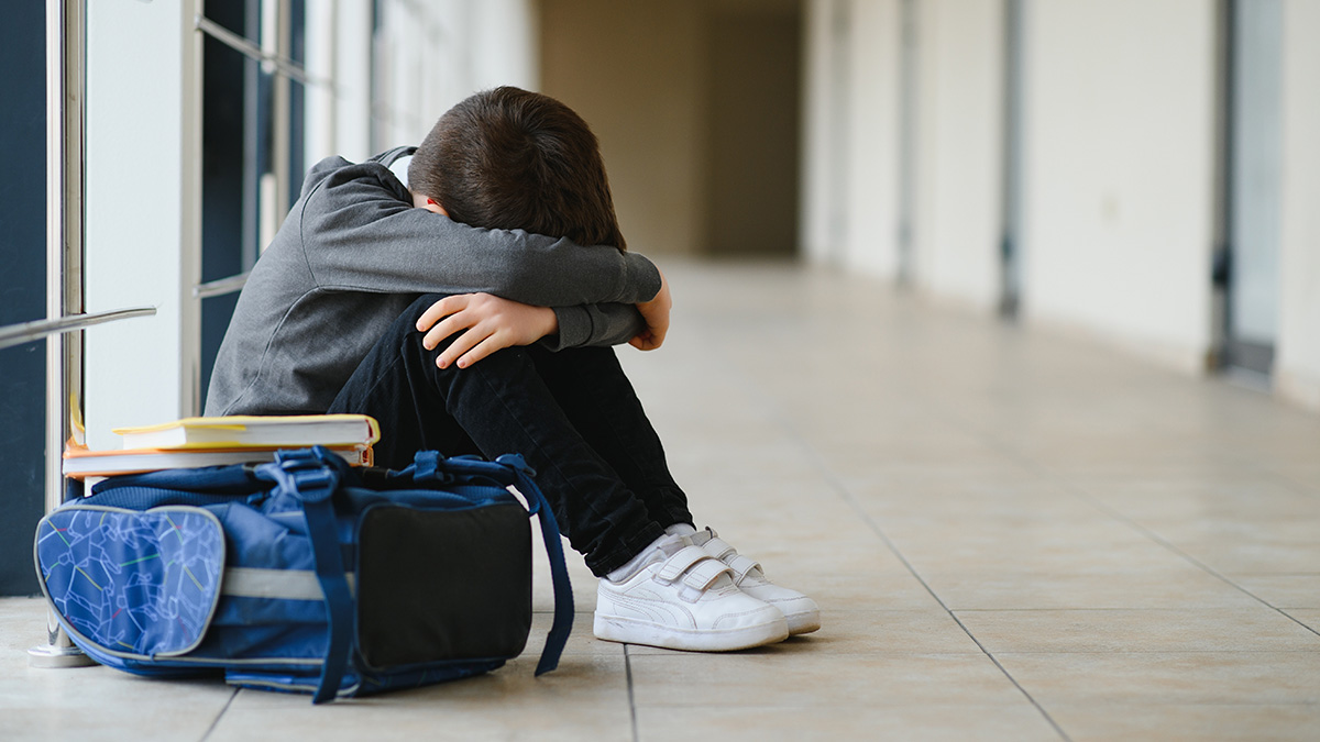 Little,Boy,Sitting,Alone,On,Floor,After,Suffering,An,Act