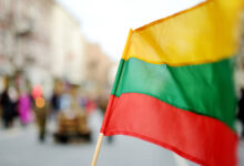 Операция НАТО в Литве по спасению M88 Hercules объединила усилия Министерства обороны Lithuanian,Flag,Hold,During,Celebration,Of,Restoration,Of,The,State