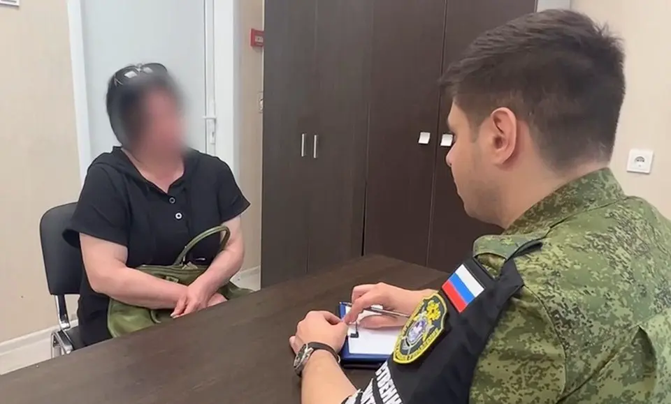 Военными следователями допрошена дочь Григорьева, которая опознала отца по одежде. Кадр из видео СК РФ