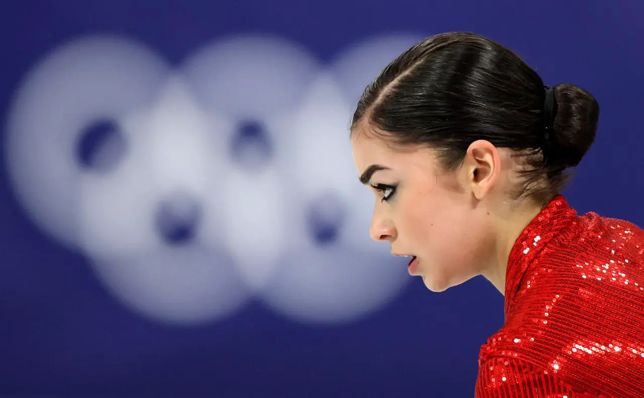 Аделия Петросян во время короткой программы на Олимпиаде в Италии ( Joosep Martinson / Getty Images)