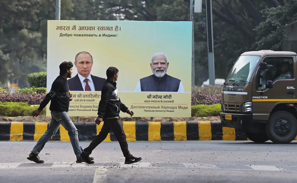 Рекламный щит с портретами Владимира Путина и Нарендры Моди в Нью-Дели, Индия (AP / ТАСС)