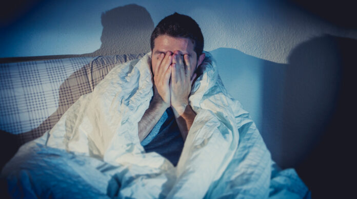 young sick looking man suffering mental disorder or depression