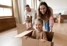 HappyParentsPlayingWithCuteSmallKidsDaughtersLaughingOn