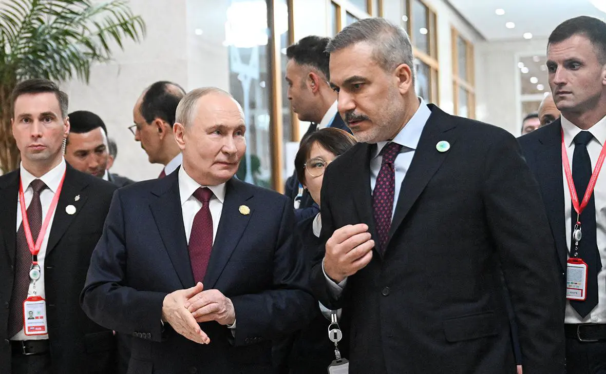 Владимир Путин и Хакан Фидан (Кристина Кормилицына / ТАСС)