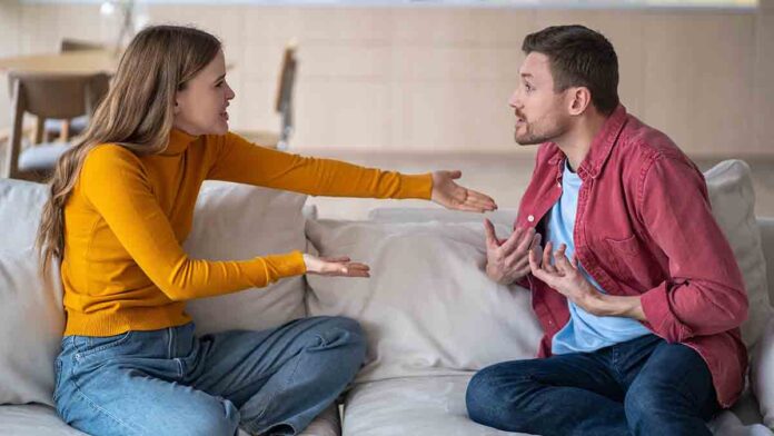 MarriedCoupleSpousesQuarrelSquabblingFightingVigorouslyGesticulatingWhileSitting