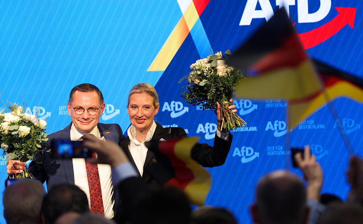 Тино Хрупалла и Алиса Вайдель (Wolfgang Rattay / Reuters)