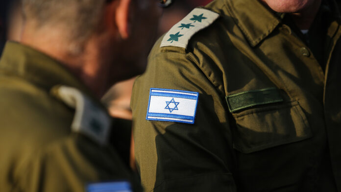 DetailsWithTheIsraeliFlagOnAMilitaryMedicUniform