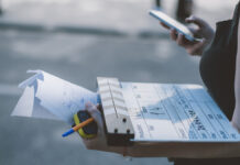 Почувствуй себя создателем кино в кинопарке «Москино» AssistantDirectorWithClapperboardOnSetClose-upOfFirecrackersFor