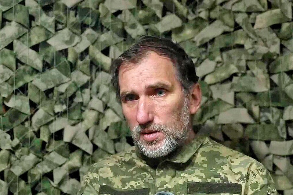 В кадре - временно исполняющий обязанности командира роты ВСУ Константин Таукач.