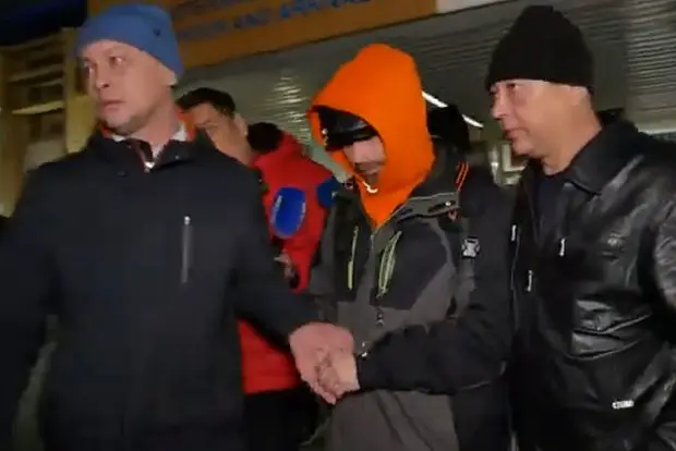 Михаил Пичугин (в центре)