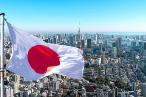 Япония смягчает санкции в отношении Виолетты Пригожиной и других граждан РФ Panoramic,View,Of,Tokyo,And,Japanese,Flag,,Japan.