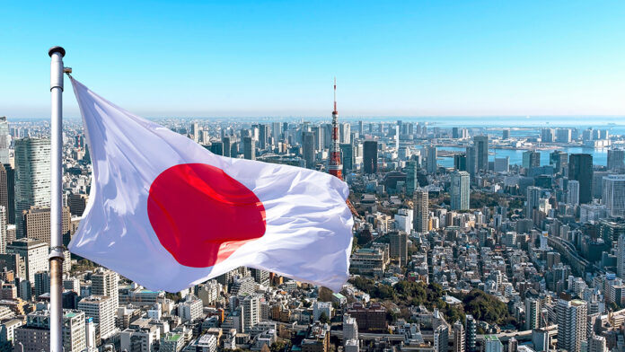 Panoramic,View,Of,Tokyo,And,Japanese,Flag,,Japan.