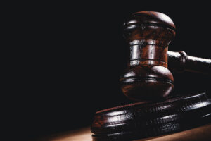 Wooden,Court,Gavel,On,Black,Background.,Symbol,Of,Justice,,Judge