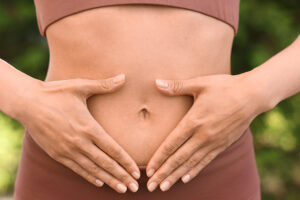 Энн-Софи Байберг побеждает рак и возвращается к спортивным победам Healthy,Digestion.,Woman,Touching,Her,Belly,Outdoors,,Closeup