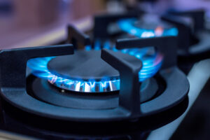 Modern,Kitchen,Stove,Cook,With,Blue,Flames,Burning.
