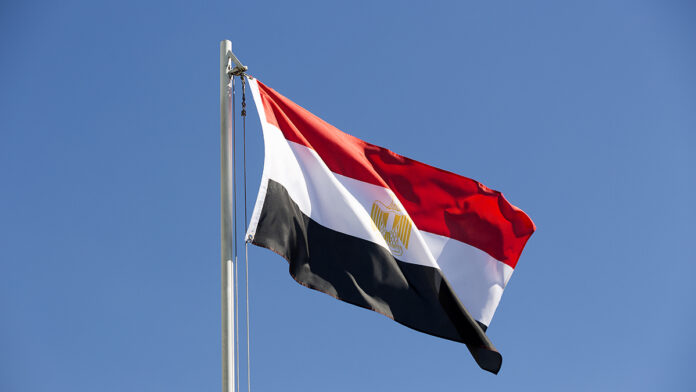 National,Flag,Of,Egypt,On,A,Flagpole,In,Front,Of