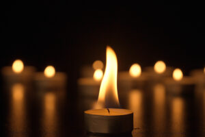 Burning,Candles.,The,Candles,Burn,Against,A,Black,Background,And