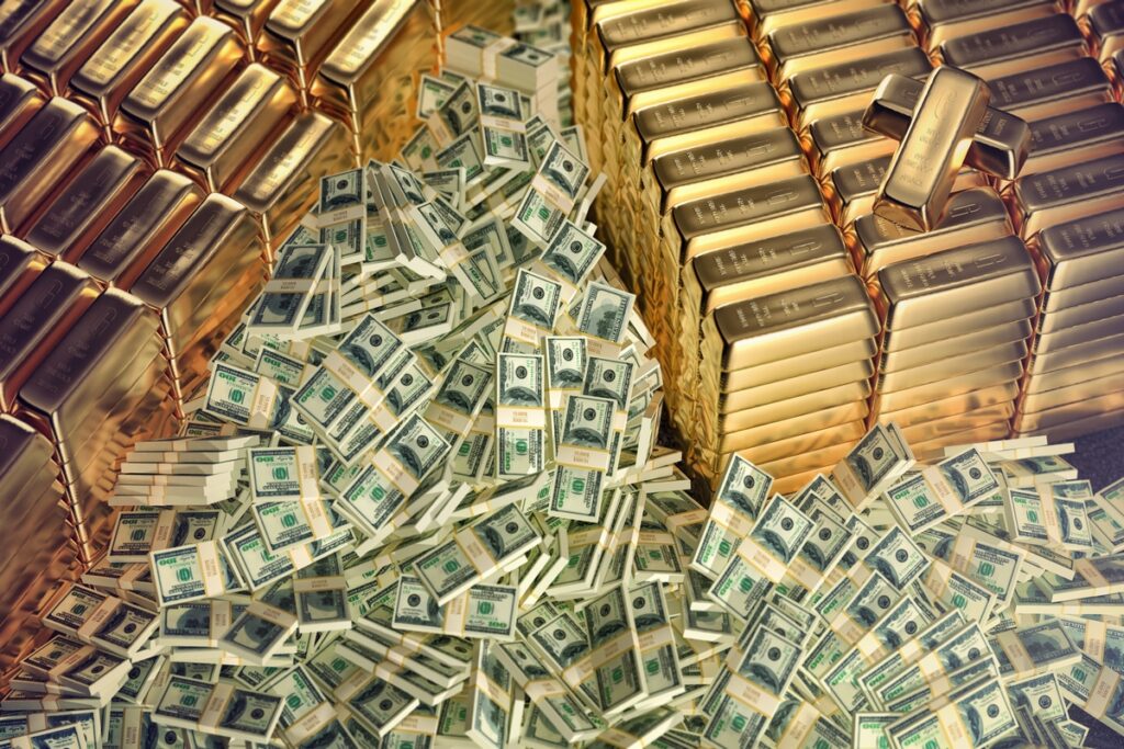Блестящие золотые слитки и долларовые банкноты