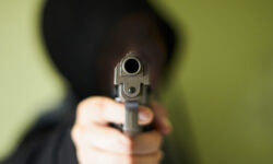 Мужчина устроил стрельбу по пассажиру автобуса в подмосковной Балашихе HumanTookAimFromThePistolInAgainstGreenBackground