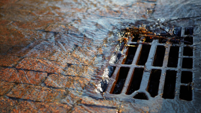 Water flows into the hatch on a spring sunny day