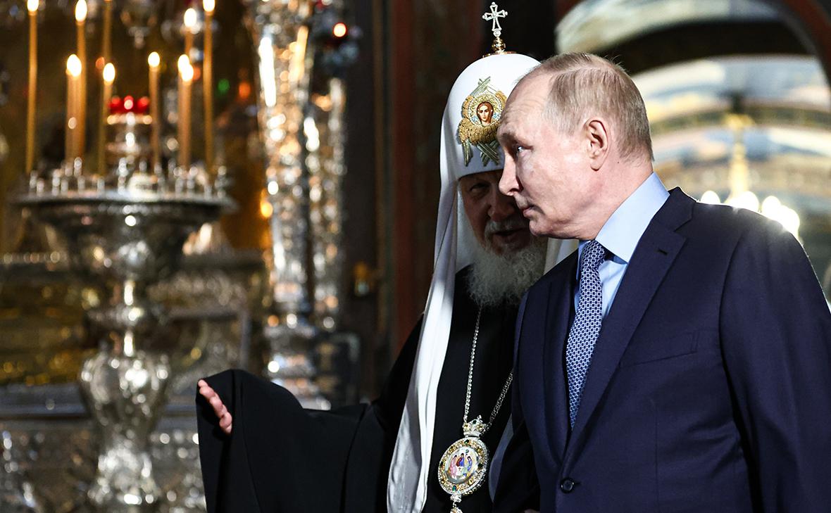 Патриарх Кирилл и Владимир Путин (Михаил Терещенко / ТАСС)