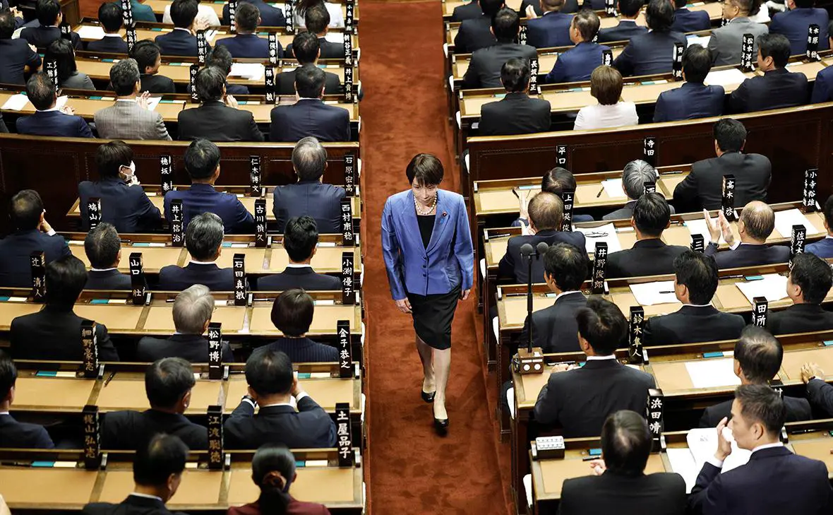 Санаэ Такаити (Kyodo / Reuters)