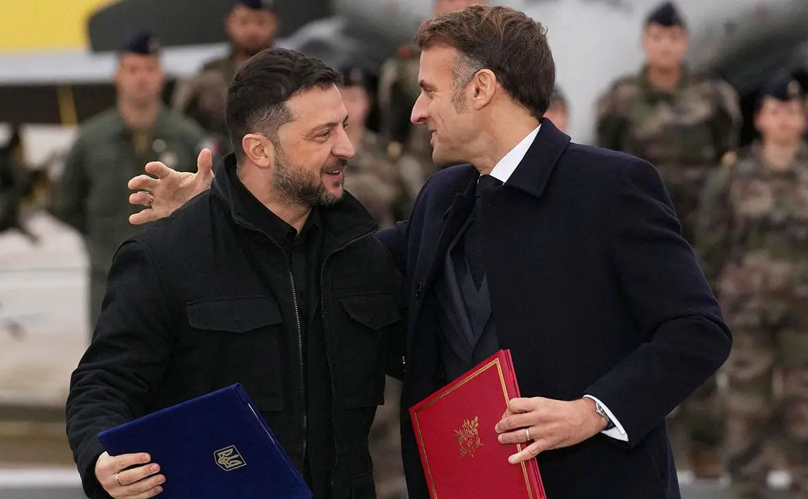 Владимир Зеленский и Эмманюэль Макрон (Christophe Ena / Reuters)