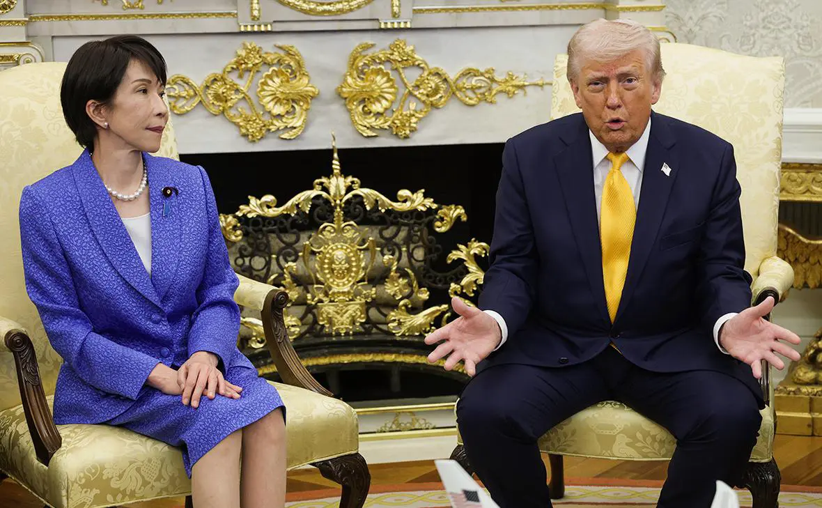 Санаэ Такаити и Дональд Трамп (Alex Wong / Getty Images)