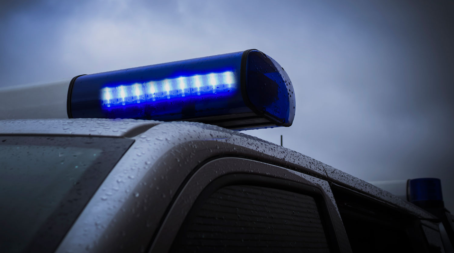 Неожиданный поворот: история любви и магии в церковном приходе police car on her flashers blue close-up