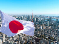 Panoramic,View,Of,Tokyo,And,Japanese,Flag,,Japan.