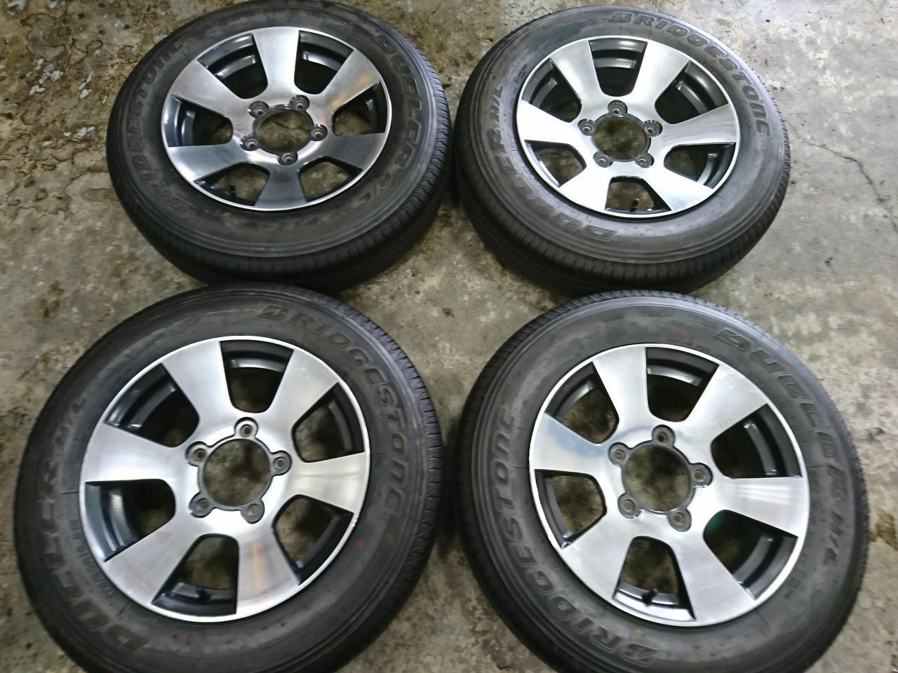 Комплект шин BRIDGESTONE DUELER H/L 852 + штатные диски Suzuki JB23/ Jimny крестовой