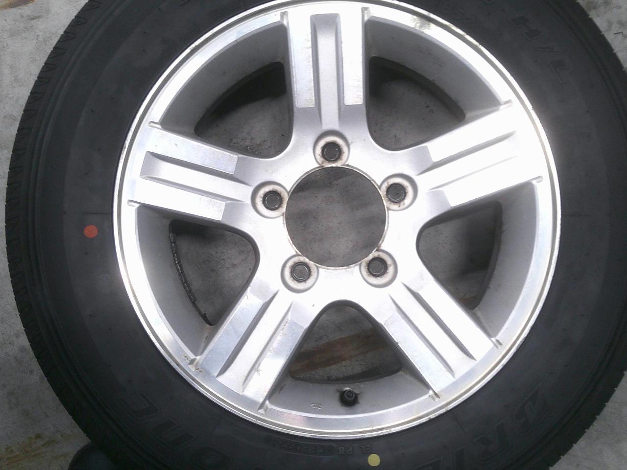 Комплект шин BRIDGESTONE DUELER H/L + штатные диски Suzuki Jimny штатный диски со спицами