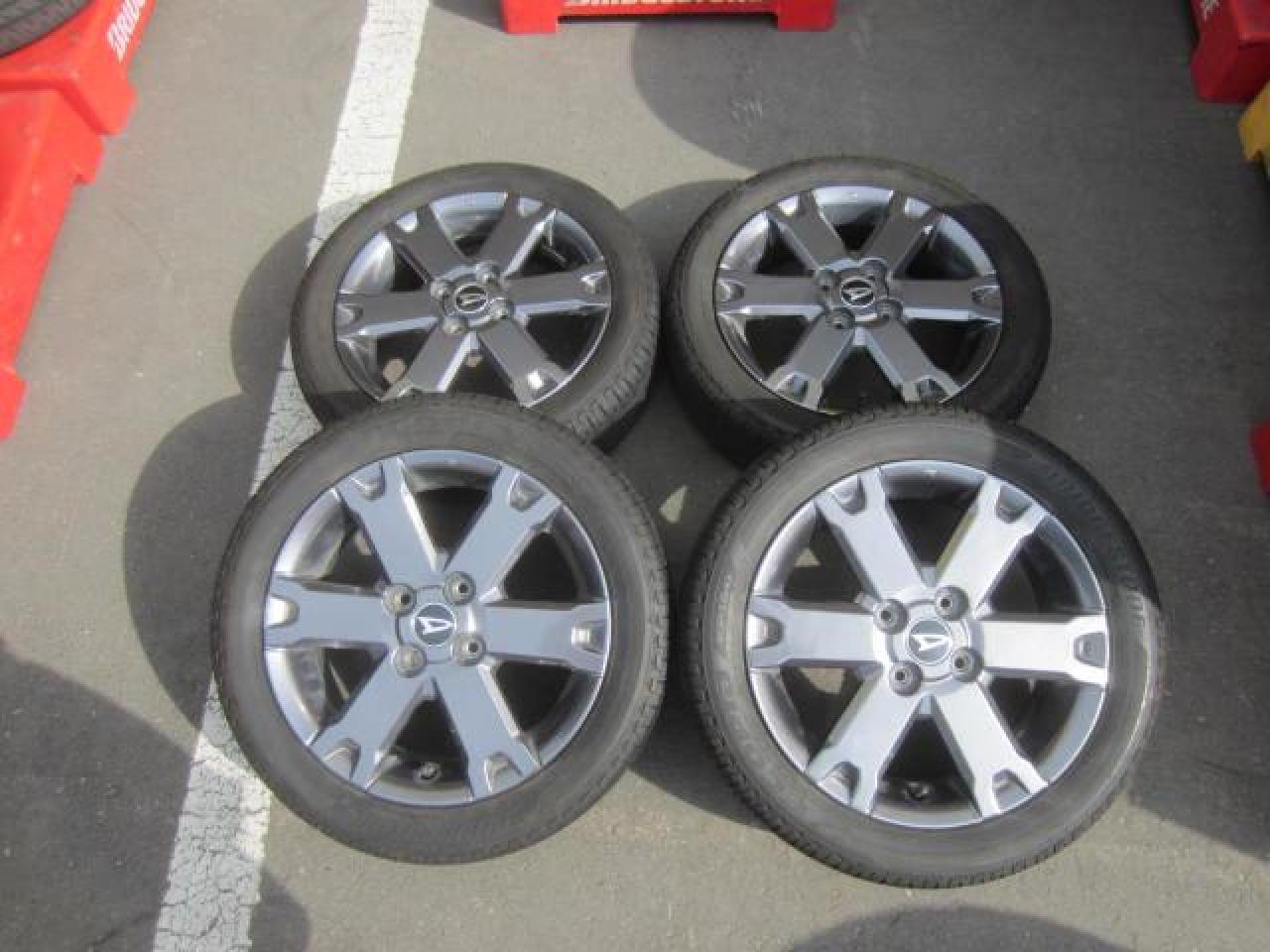 Комплект шин DUNLOP ECOPIA EP150 + штатные диски Daihatsu Tanto крестовой