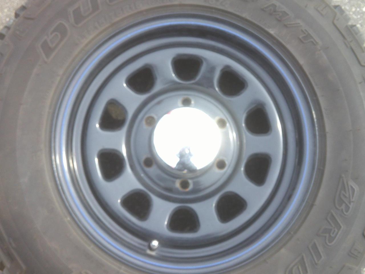 Комплект шин BRIDGESTONE DUELER M/T + диски DAYTONA чёрный стальные