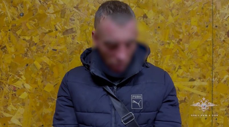 Задержанный подозреваемый стоп-кадр из видео полиции