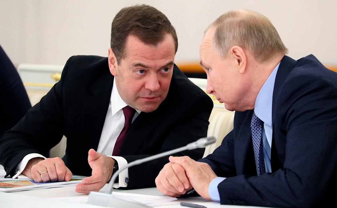 Дмитрий Медведев и Владимир Путин (Екатерина Штукина / РИА Новости)