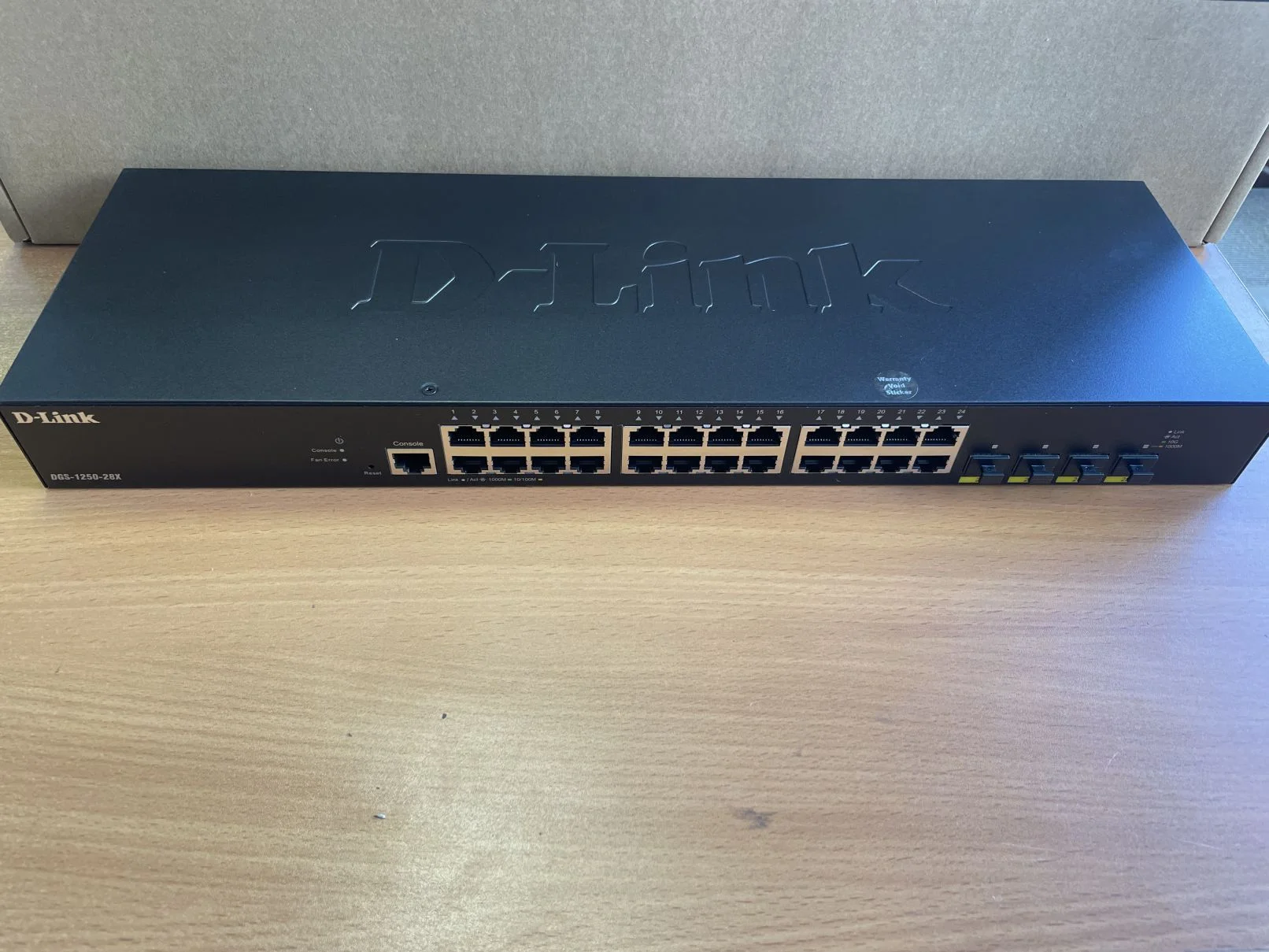 Коммутатор D-Link DGS-1250-28X/A1A 24G 4SFP+ управляемый