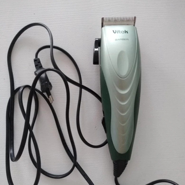 Машинка для стрижки Vitek Euphoria VT-1356 черный (насадок в компл:4шт)