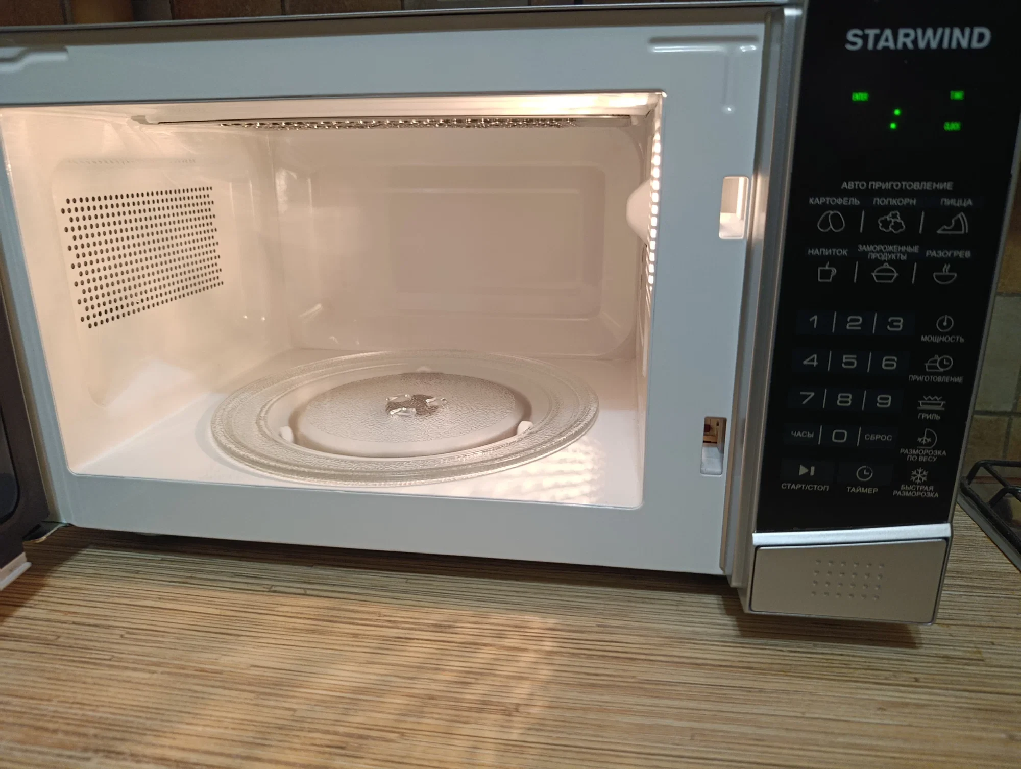 Микроволновая печь - СВЧ Starwind SMW3120 20л. 700 Вт, серебристый/черный