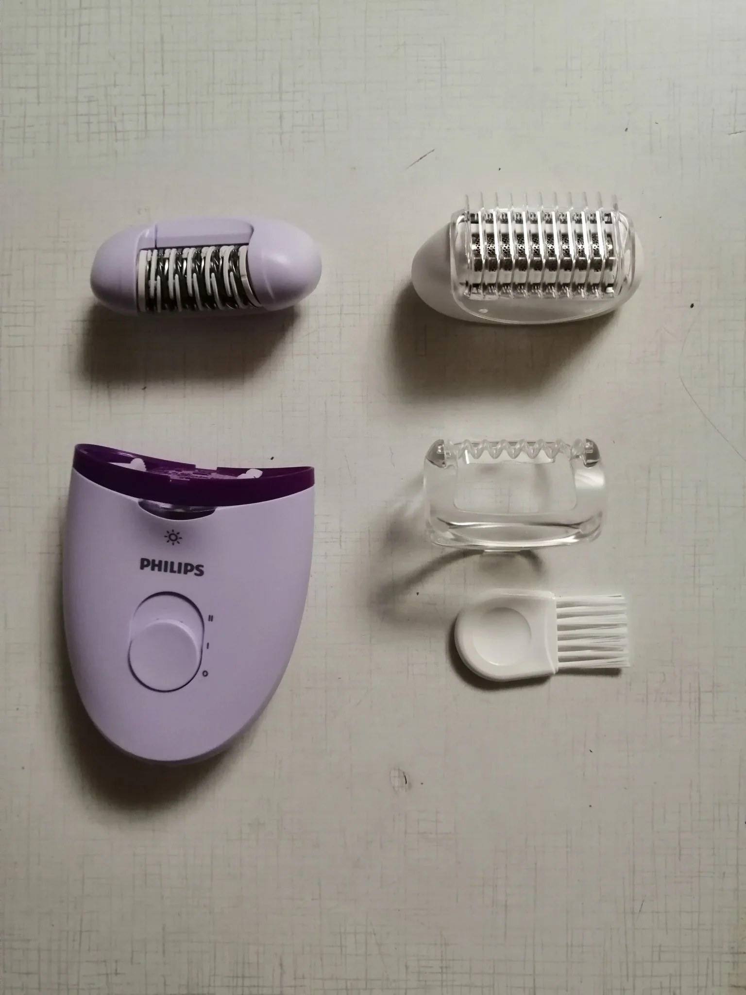 Эпилятор Philips BRE275 (20 пинцетов, насадка для бритья)